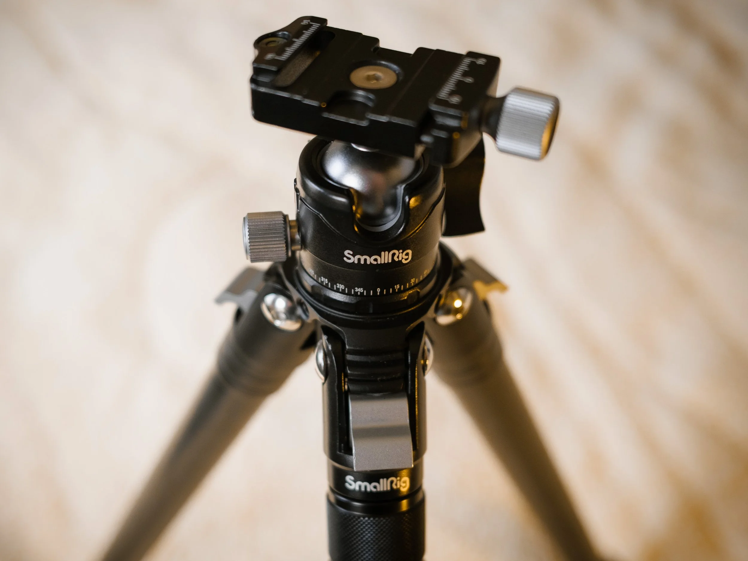 Close-up view of a SmallRig AP-10 carbon fibre travel tripod