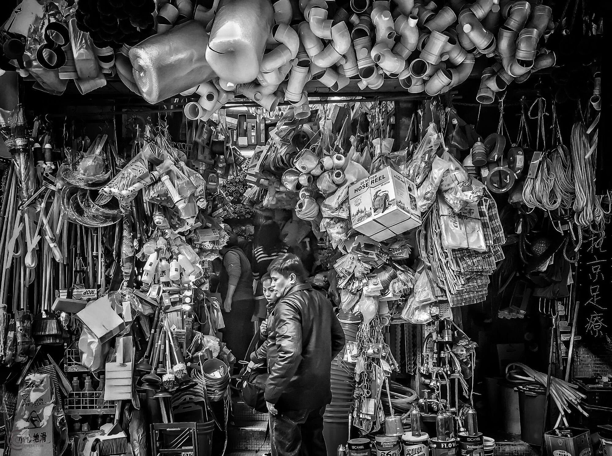 "There is a shop in there somewhere" by Col Sim