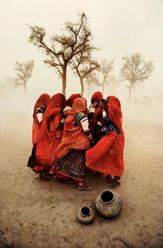Steve McCurry. Dust Storm, Rajasthan, India, 1983. 20 × 24 in | 50.8 × 61 cm. edition of 90. Signed. Fuji Crystal Archive Print. Steve McCurry defines himself primarily as a storyteller—a visual narrator driven by an insatiable curiosity for the worl