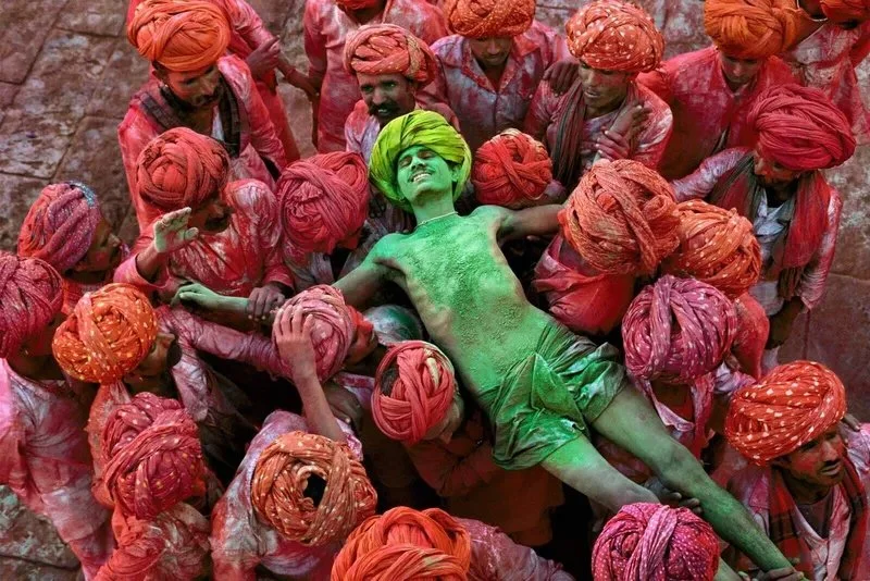 Steve McCurry. Holi Man, 1996. 40 × 60 in | 101.6 × 152,4 cm. edition of 10. Signed. Fuji Crystal Archive Print. Steve McCurry defines himself primarily as a storyteller—a visual narrator driven by an insatiable curiosity for the world and its people