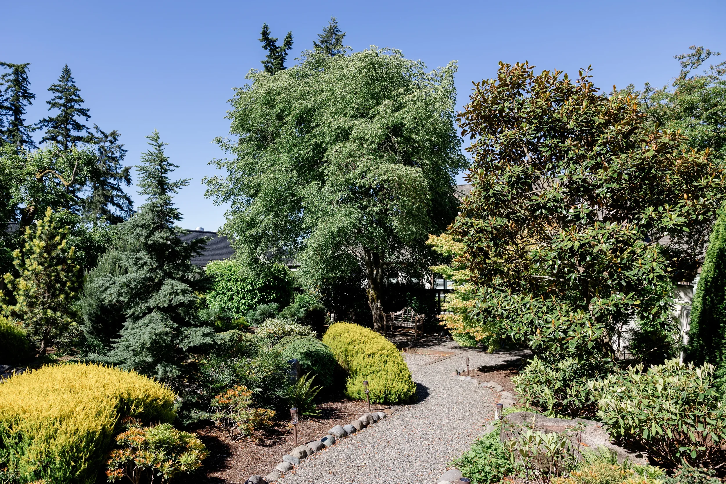Inn at Pleasant Beach garden pathway Bainbridge Island wedding venue grounds