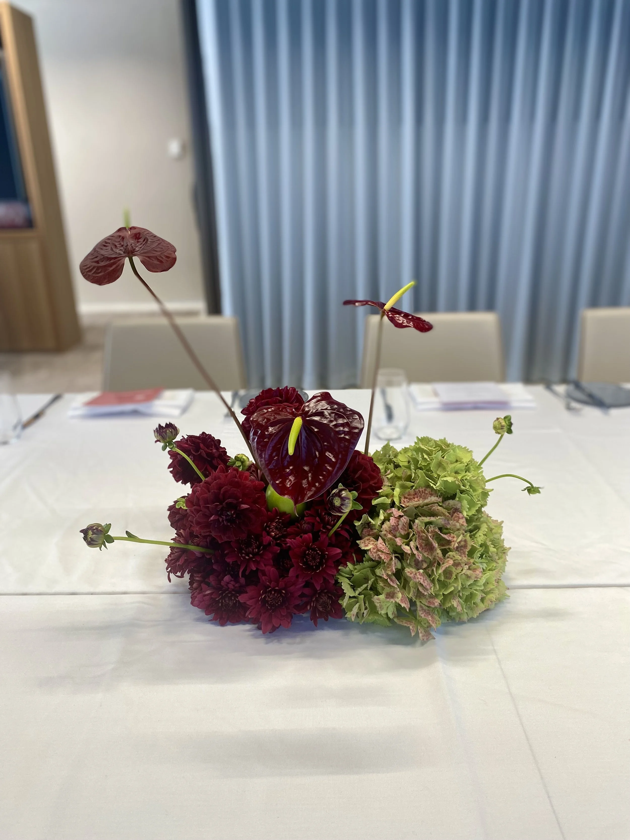 Burgundy & Green modern table arrangement.jpg