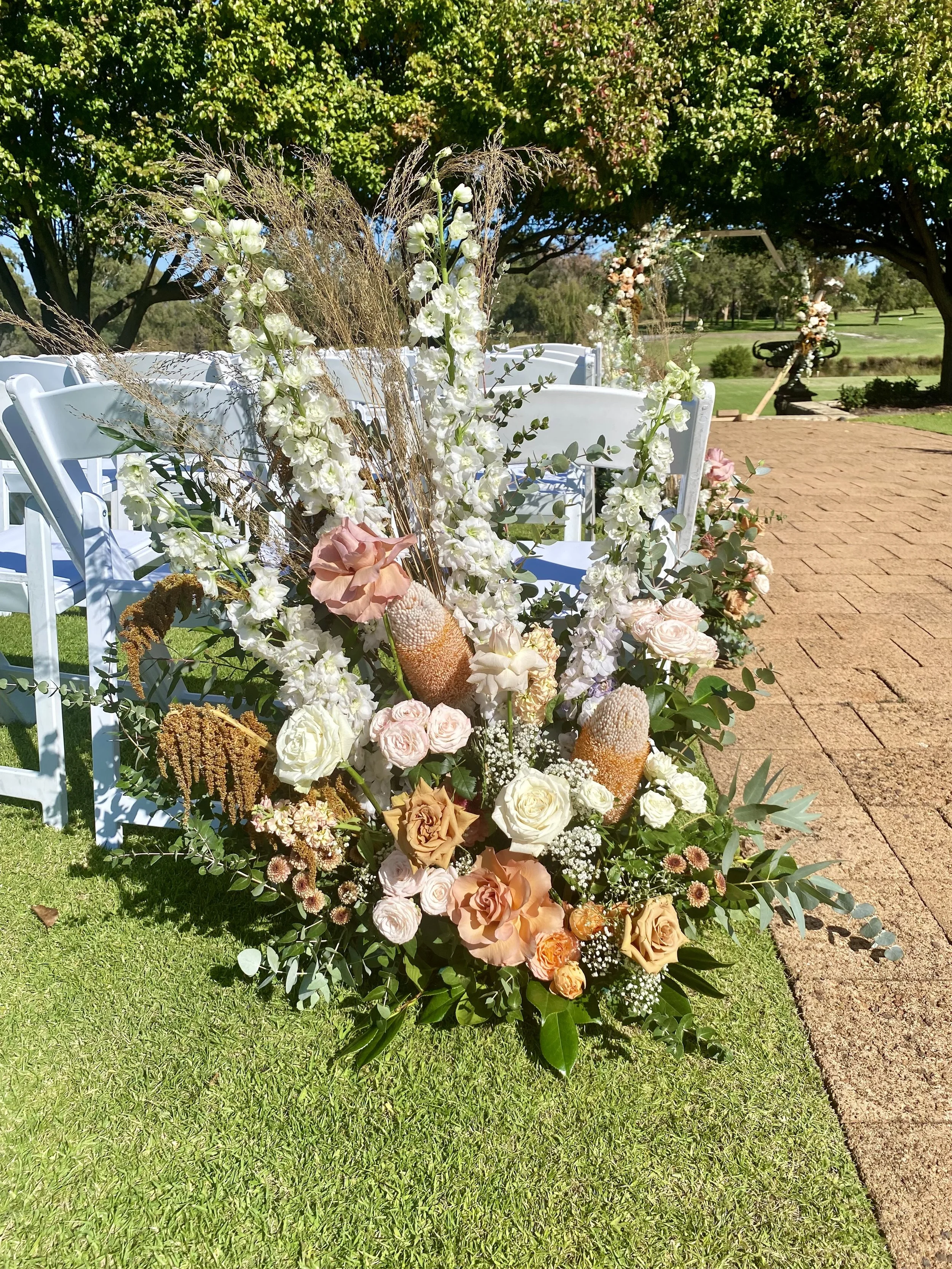 Aisle Entrance Ground florals_soft autumn colours.jpg