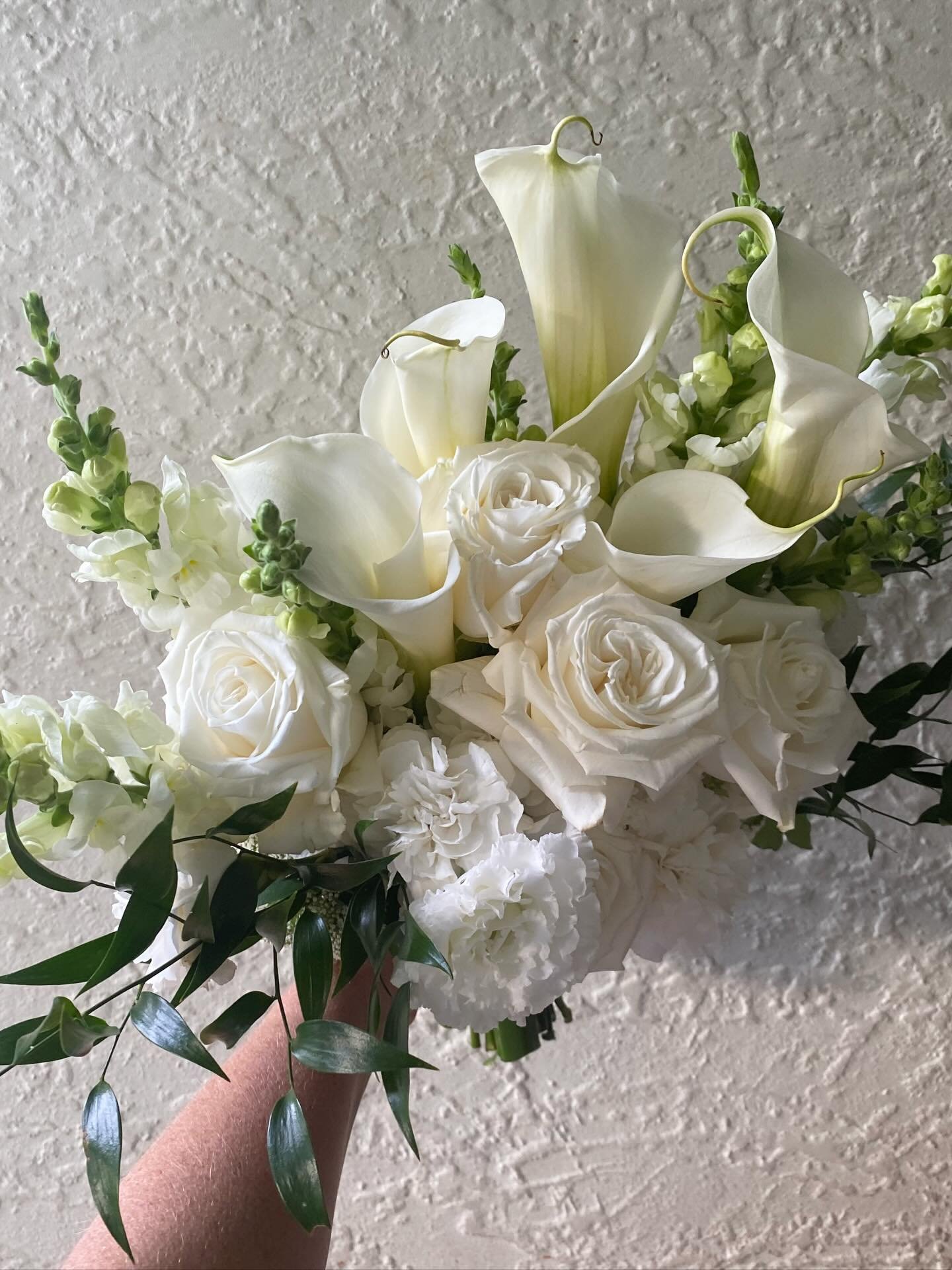 The sum of all parts.

It&rsquo;s been a while since I&rsquo;ve created an all white wedding and I&rsquo;m completely moved by the simplicity, beauty and elegance of these bouquets.

Each maid holds a single flower type small bouquet; Rose, Calla Lil