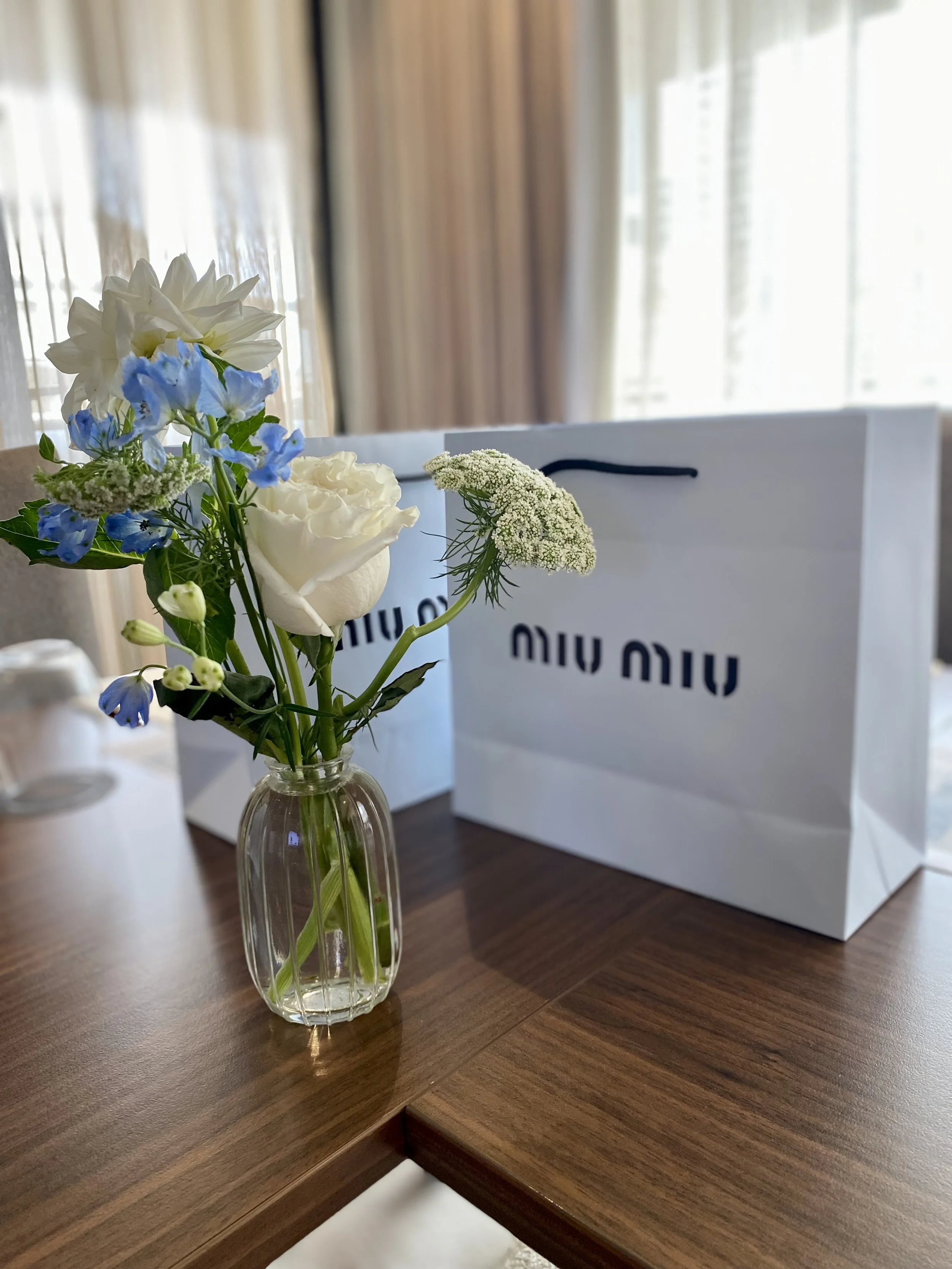 miu miu pale blue and white fresh glass bud vases.jpg