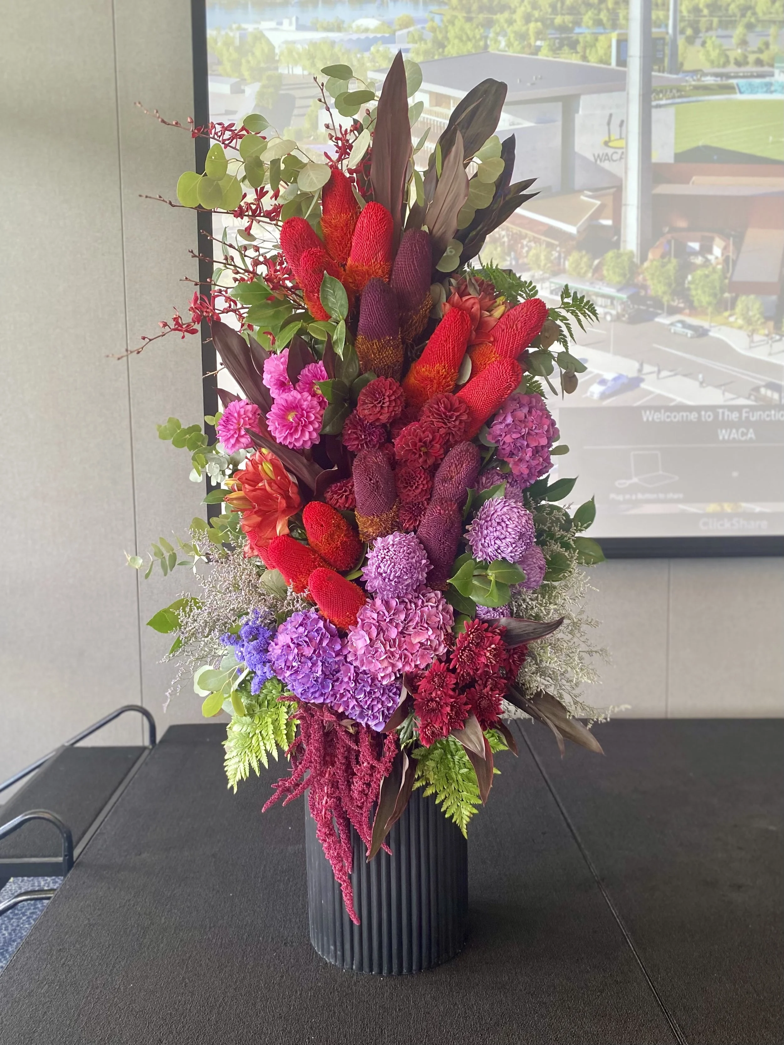 Vibrant flower Tower Stage Arrangement.jpg