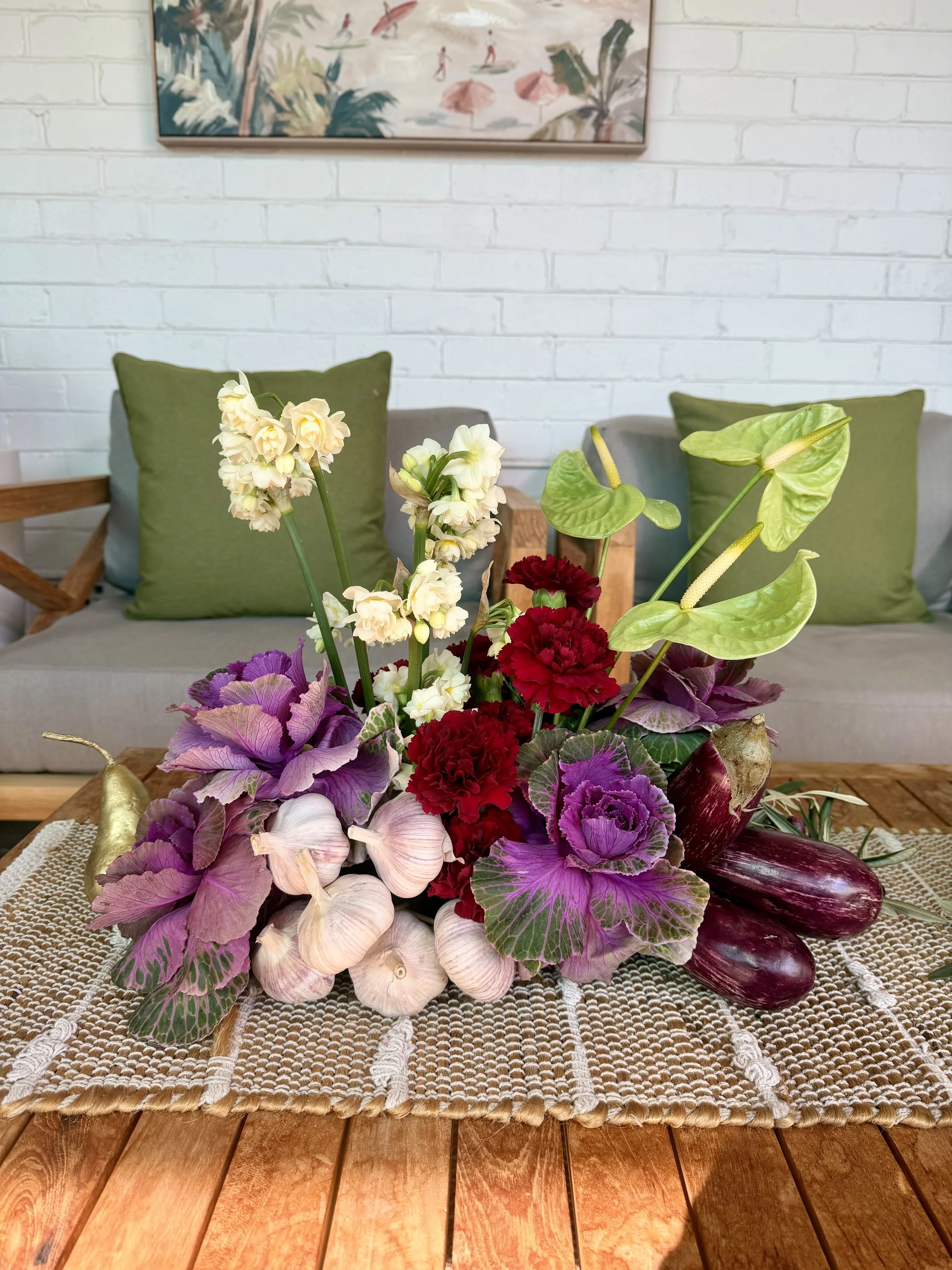 Italian themed eggplant garlic table arrangements.jpeg