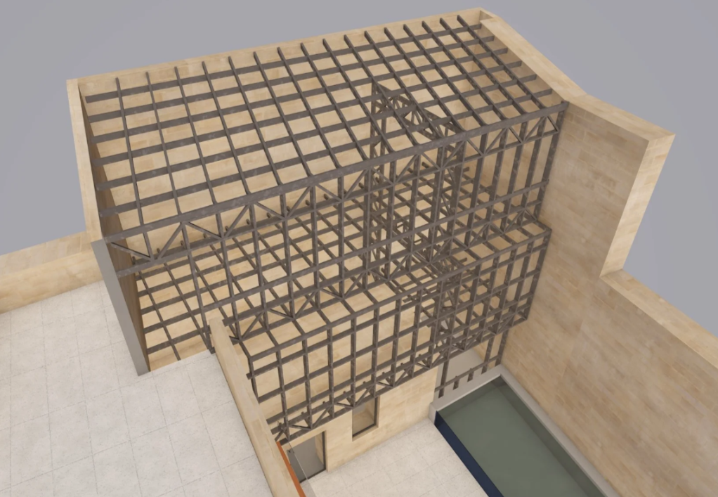 3D rendering of a building's steel framework with wood exterior walls, seen from above, showing the foundation, walls, and partial roof structure.