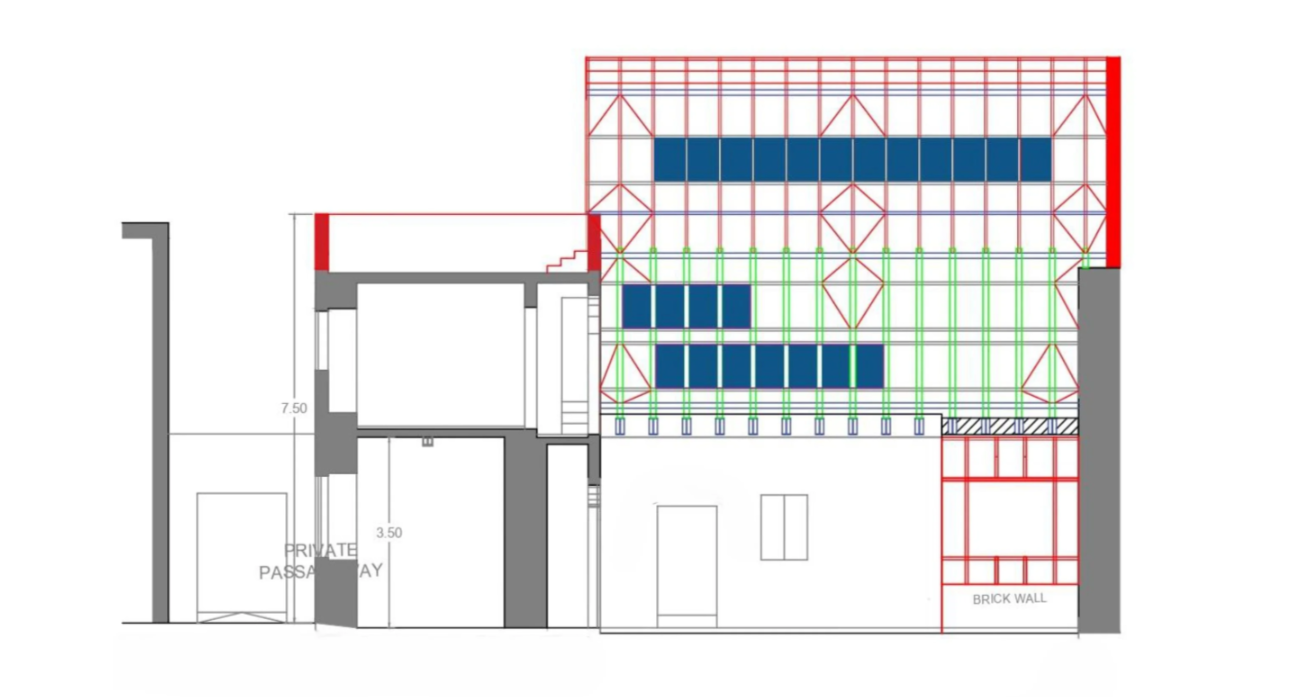 Architectural drawing of a building with structural framework, brick wall, and interior spaces.