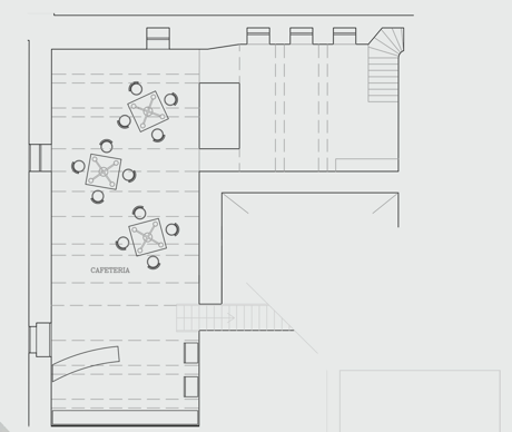 Floor plan of a cafeteria with tables, chairs, and stairs.