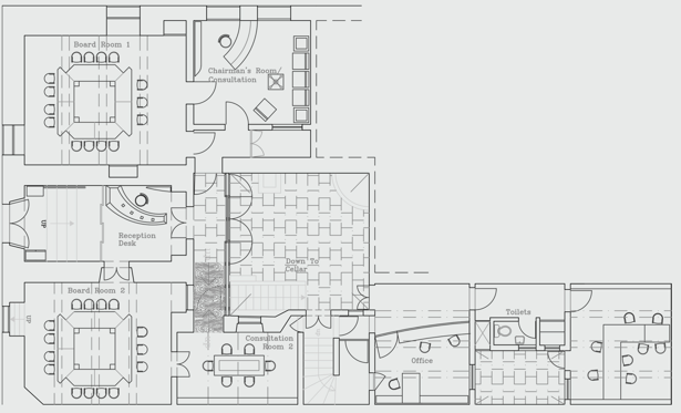 Floor plan of an office or conference center with rooms labeled for meetings, reception desk, and restrooms.
