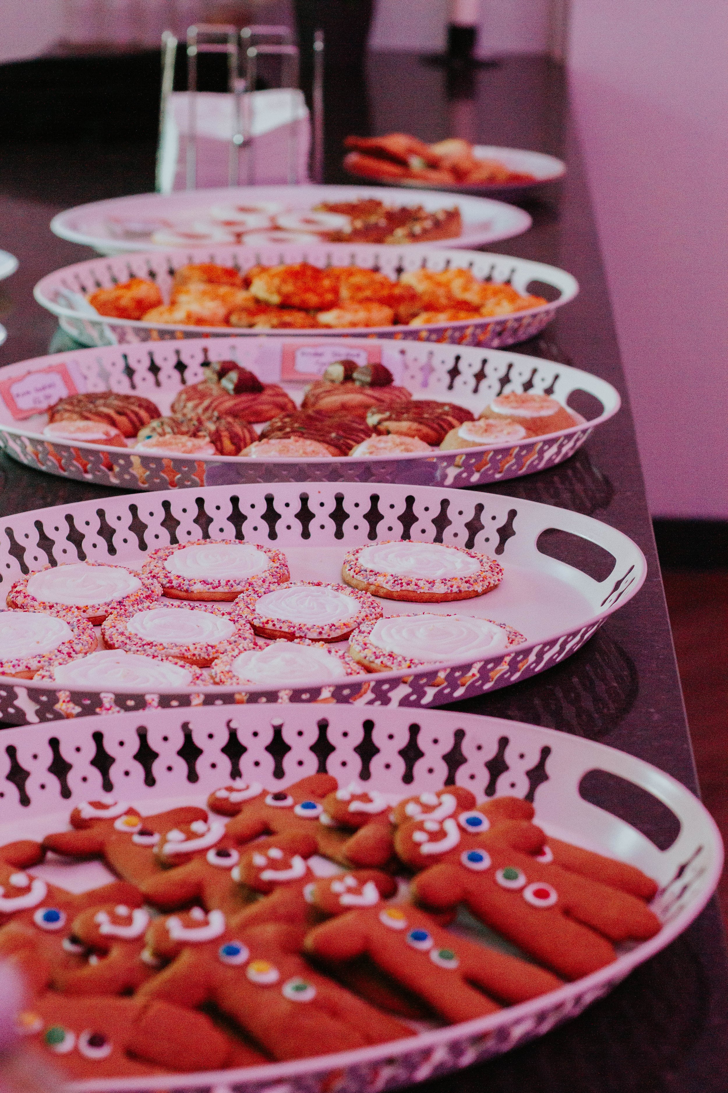 Four trays of deserts and pastries