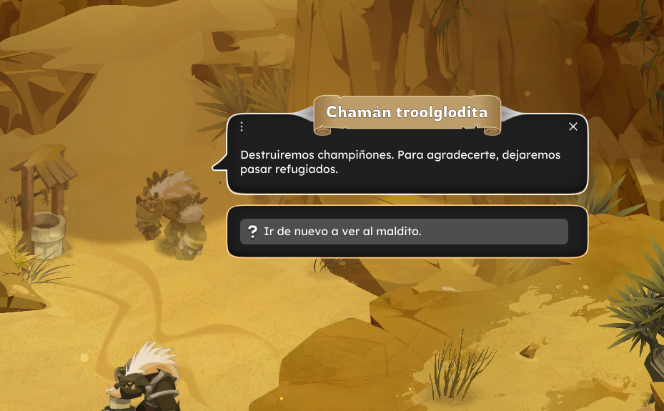 Dofus Torrente Arcano. Pantalla de videojuego con personajes y diálogos en español, en un entorno desértico con rocas y plantas.