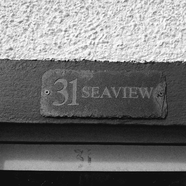 seaview-cottage-hebrides-exterior-name.jpeg