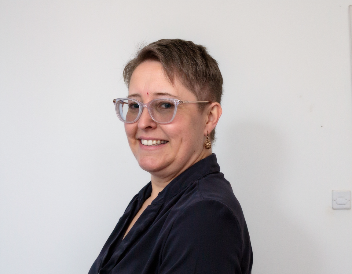 Headshot 1_white_q1ldB5S1QavAKK1n.png