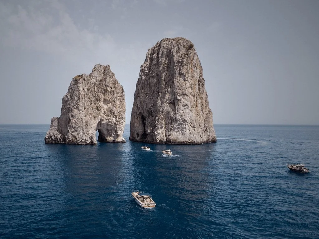 Private boat tour around Capri with views of the Faraglioni