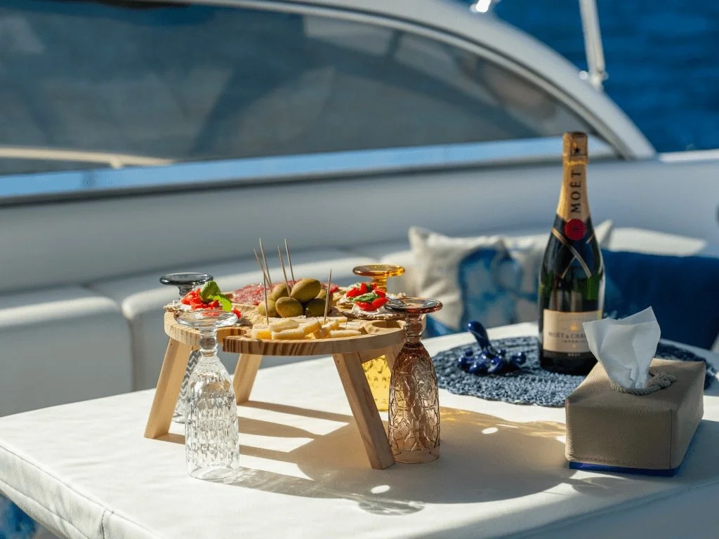 Wine and appetisers on board a Caprice Bleu boat experience