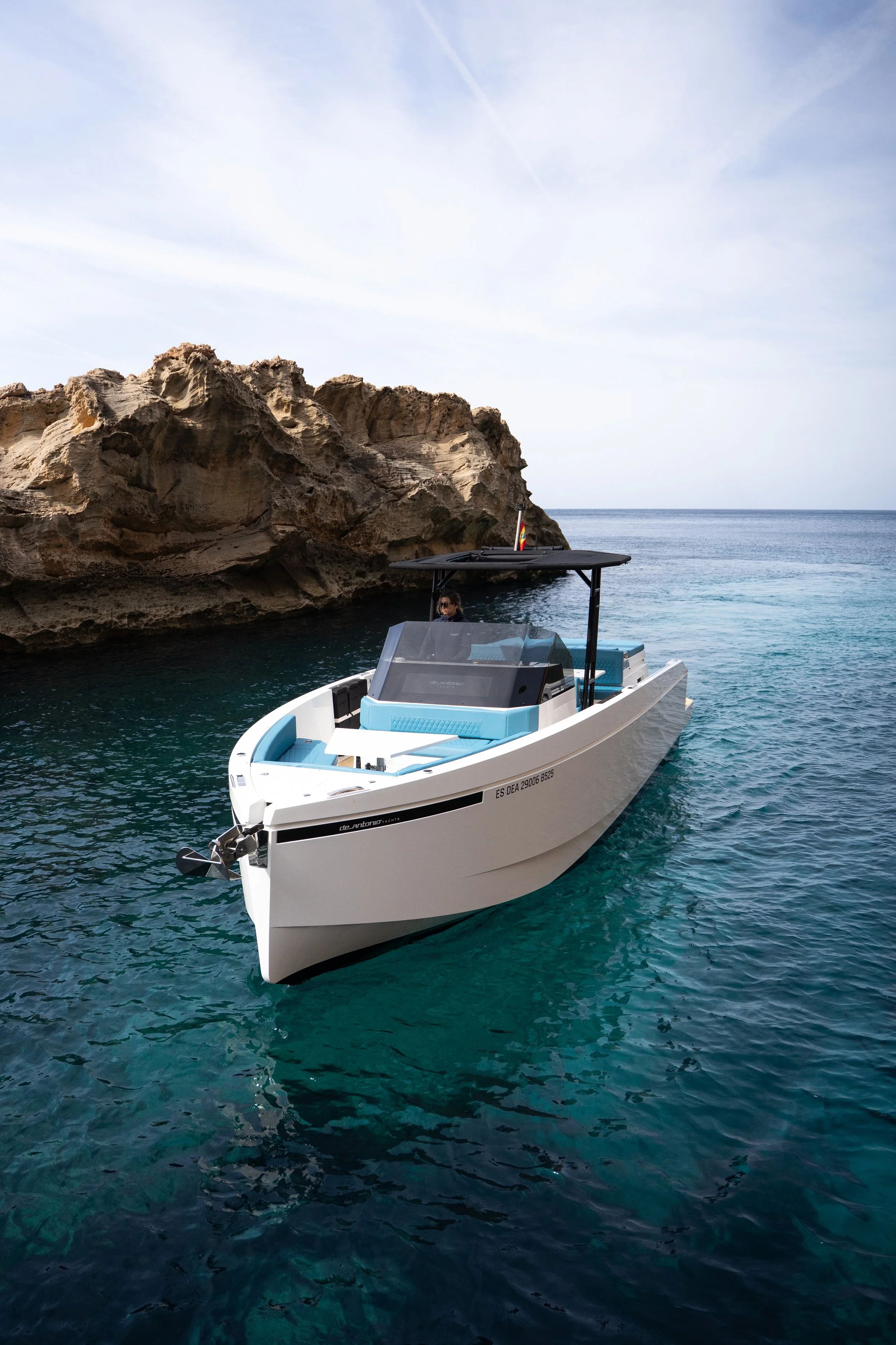 Elegant yacht departing Naples harbor toward Capri