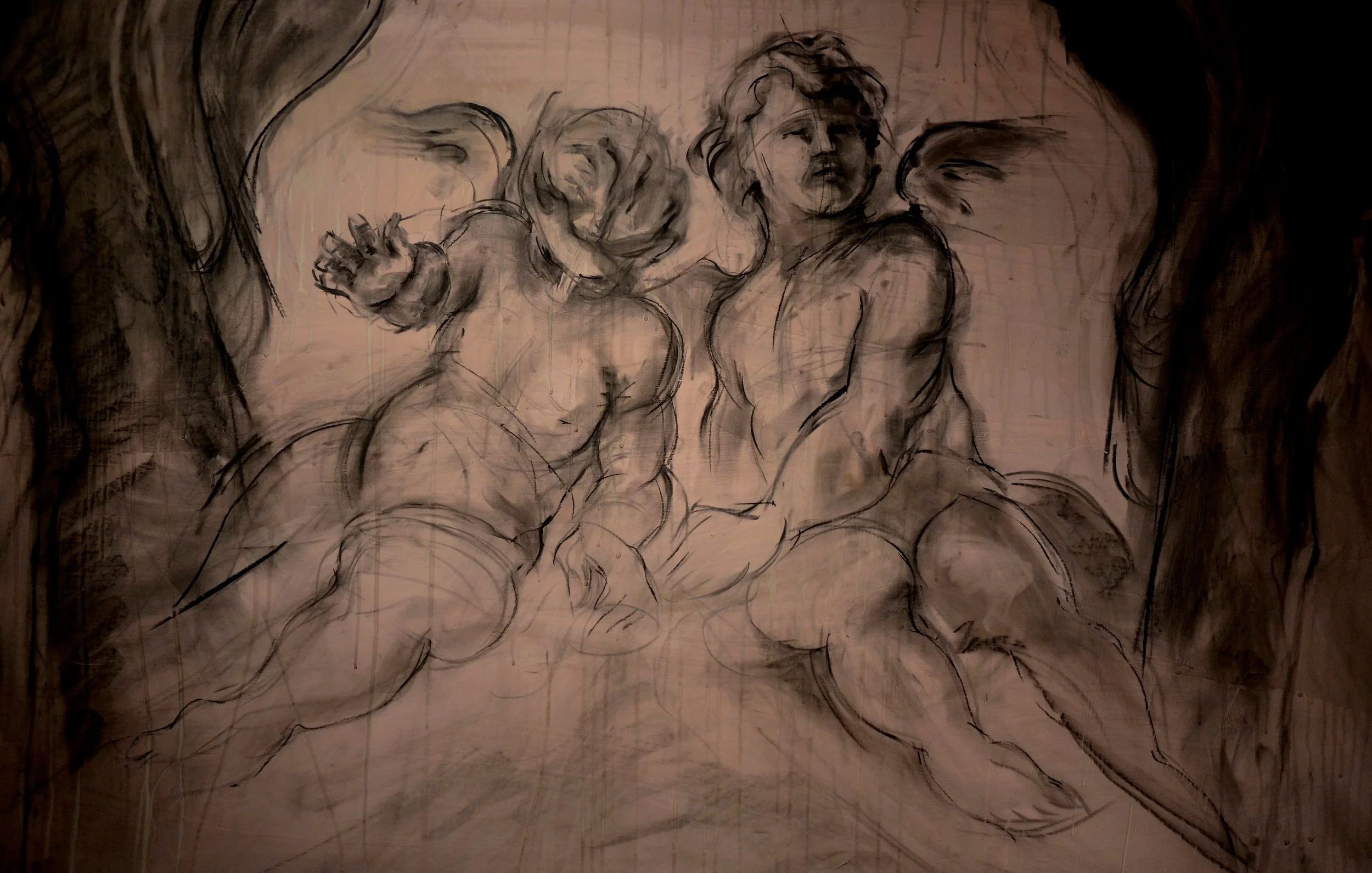 Sketch of two cherubs with wings, one with a distorted face, art style appears rough and unfinished.