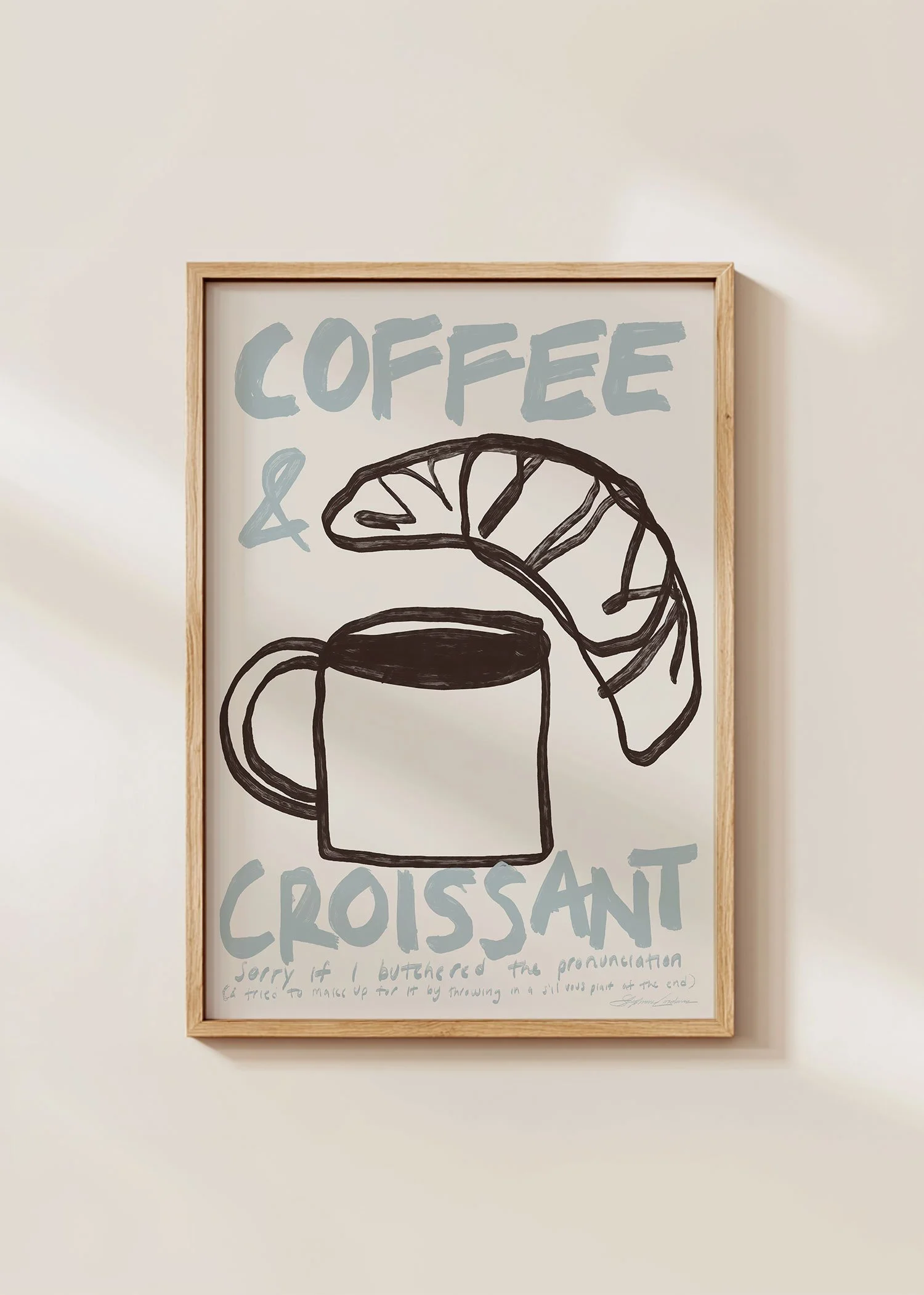 Coffe-&-Croissant-Bakery-Wall-Art-Framed-in-Minimalistic-Wall-with-Shadow-on-Print.jpg
