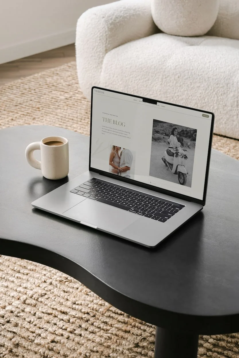 Laptop mockup of a one-week Squarespace website blog page, styled for a wedding brand