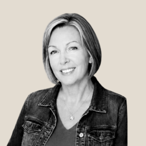 female coach wearing a black blazer