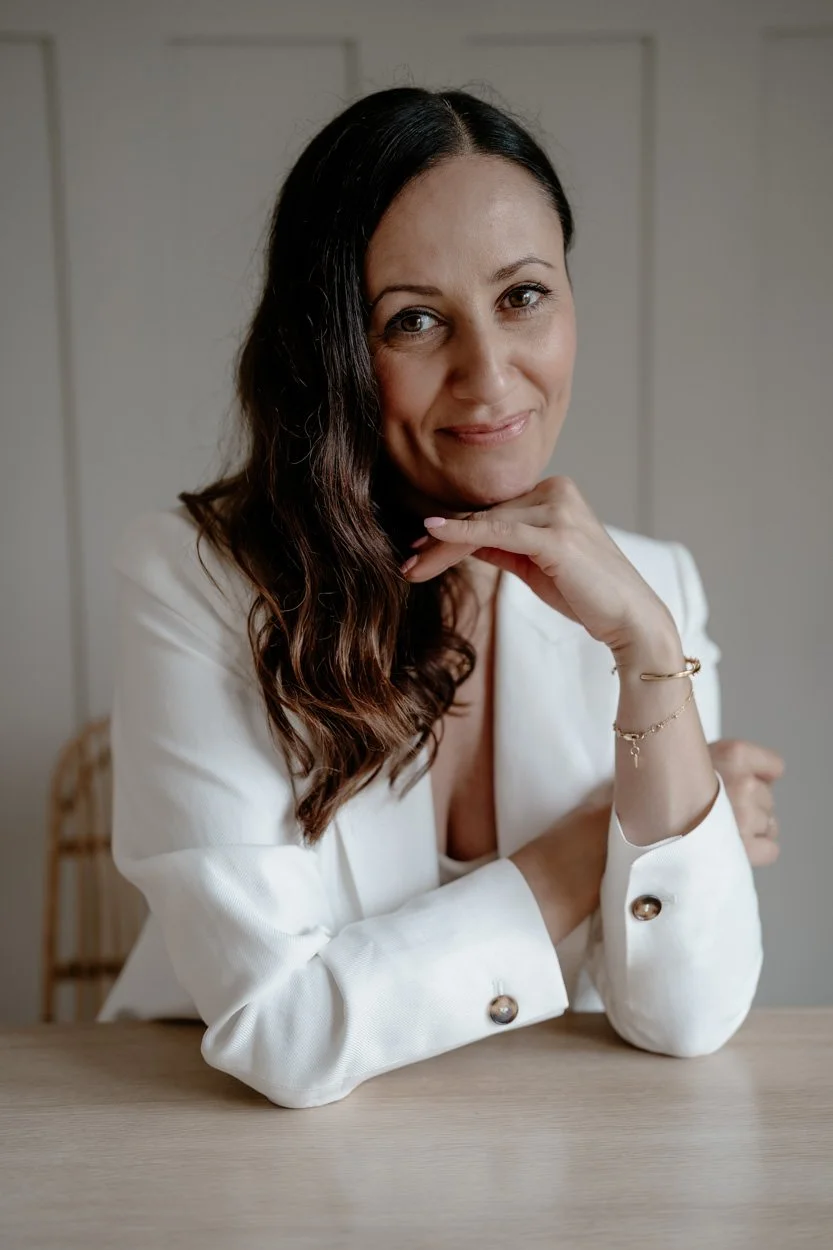Clare Butler Squarespace Website Designer Sitting at Desk