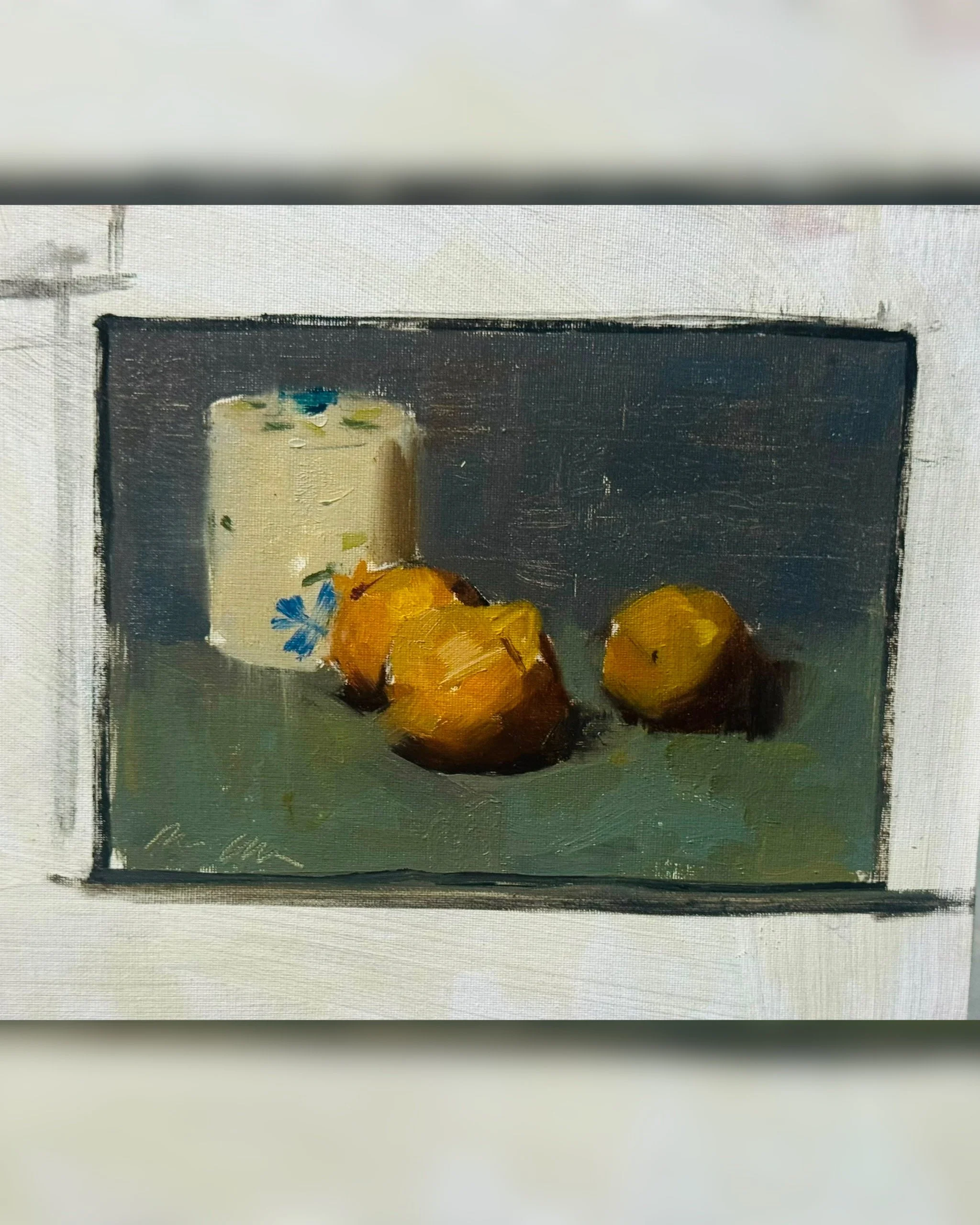 Candle and tangerines