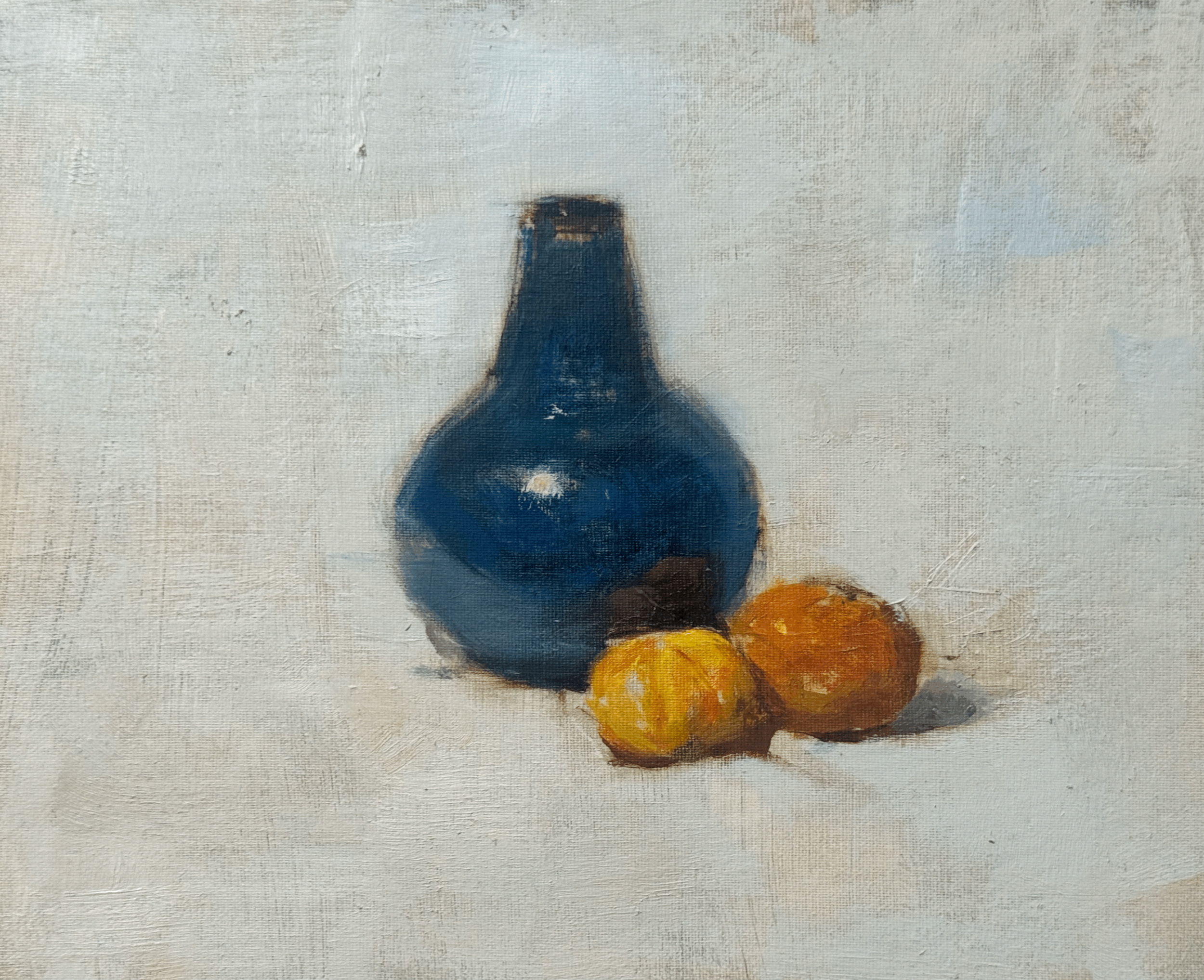 Blue bottle and tangerines