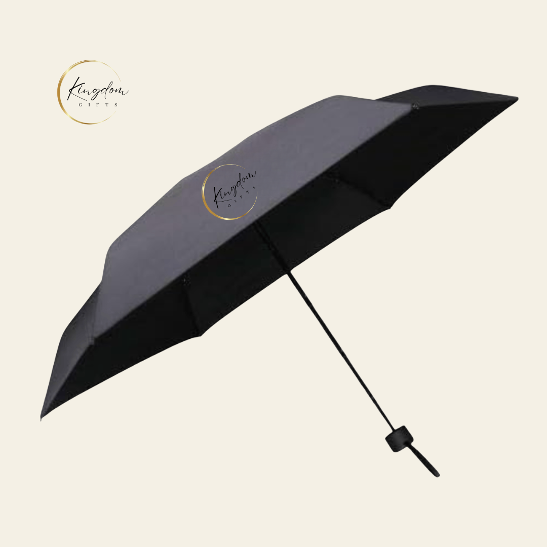 Fully opened 19” lightweight black umbrella with clean panel surface, ideal for subtle logo printing and mass promotional gifting events.