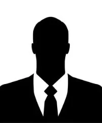 Silhouette of a person in a suit and tie