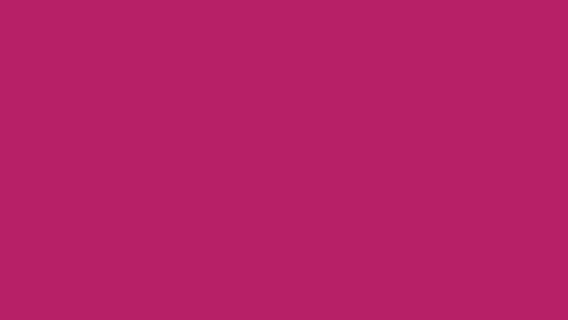 Plain pink background with no distinct objects or features.