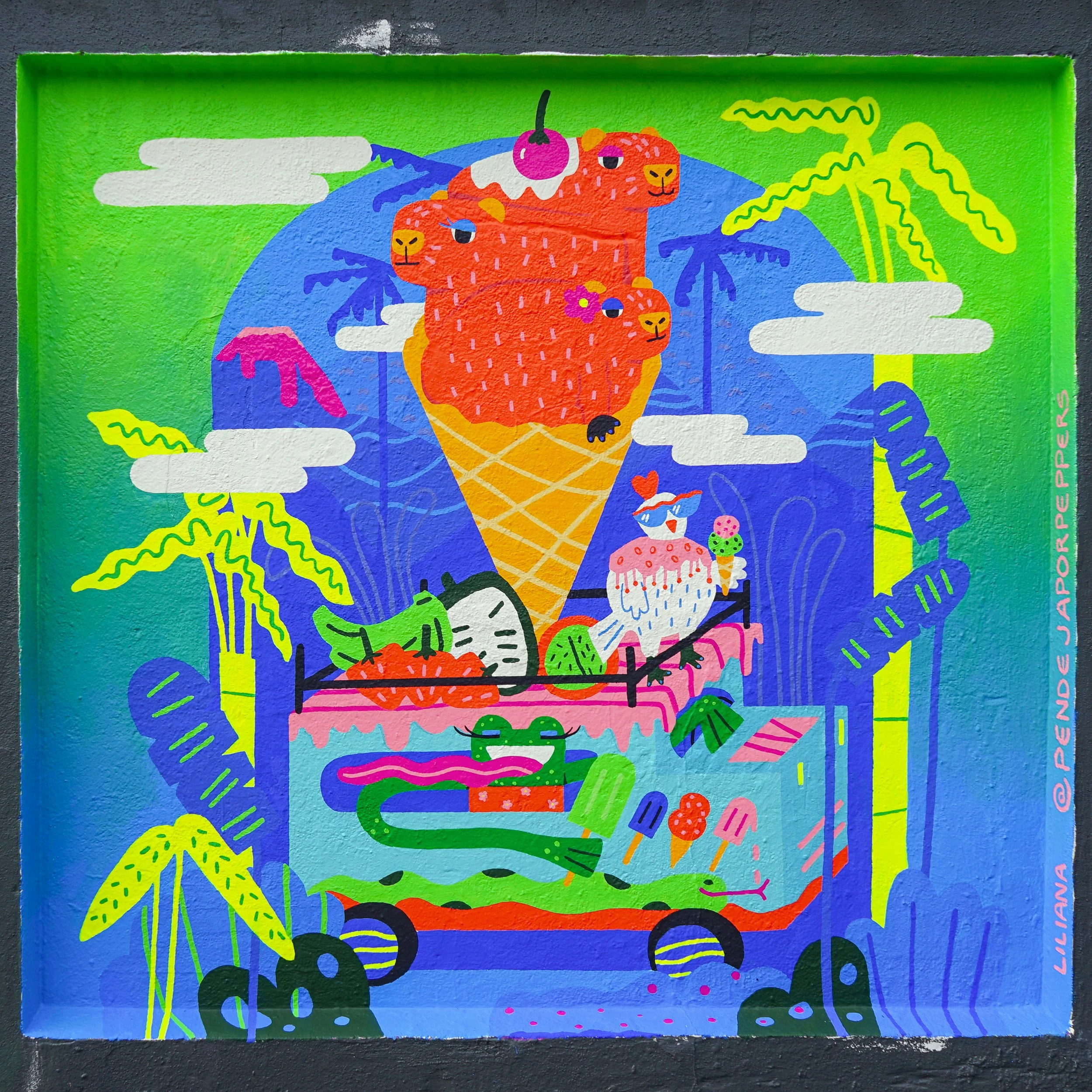Colorful street art mural featuring a tropical scene with animals, ice cream, and plants, including a lion with a cherry on its head inside an ice cream cone, surrounded by palm trees, clouds, and various playful characters.