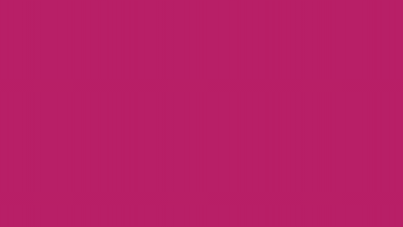 Solid pink background with no distinguishable objects or features.