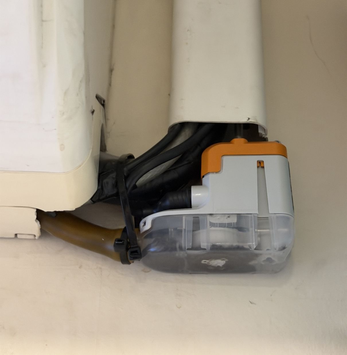 Condensate Pump Housing Missing Leaving the Pump Unsupported 