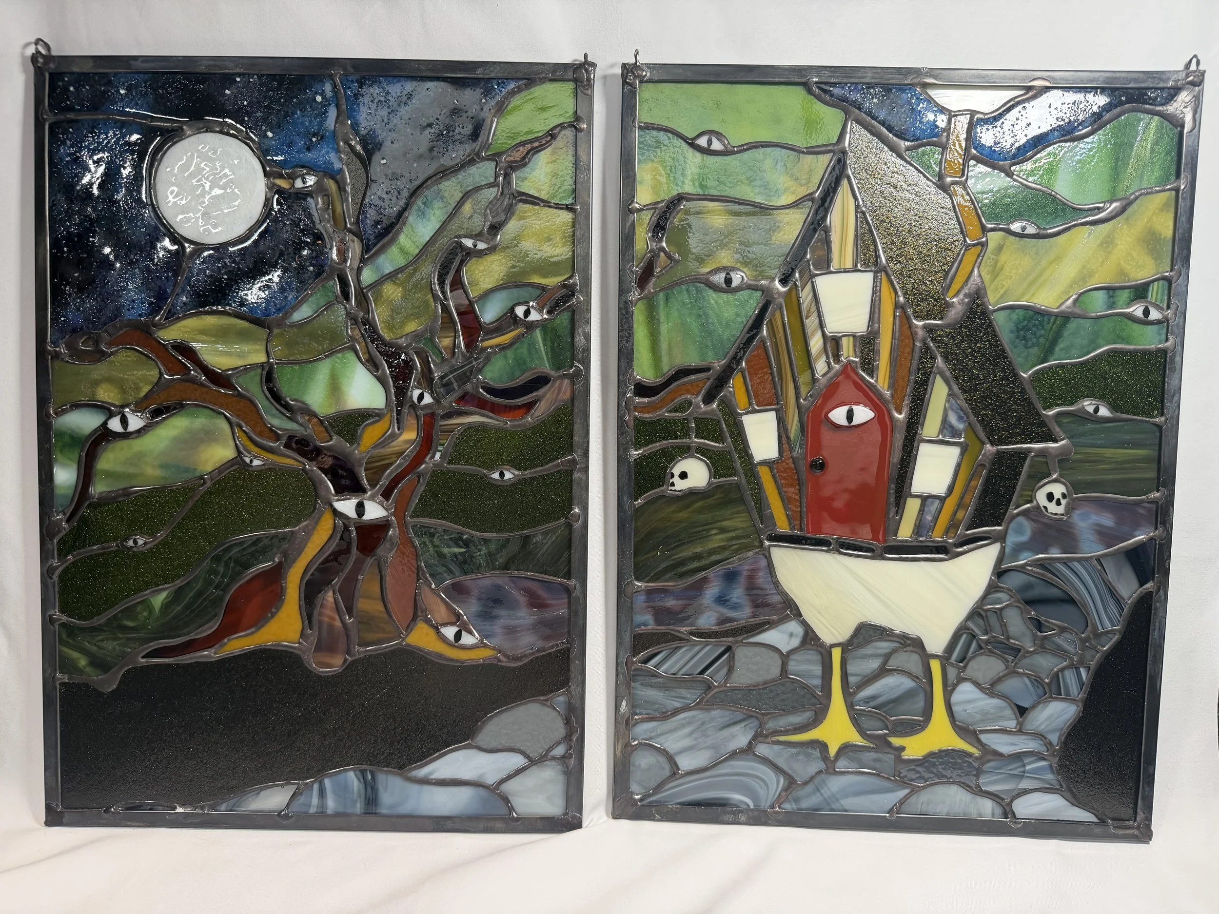 Baba Yaga stained glass artwork in daylight