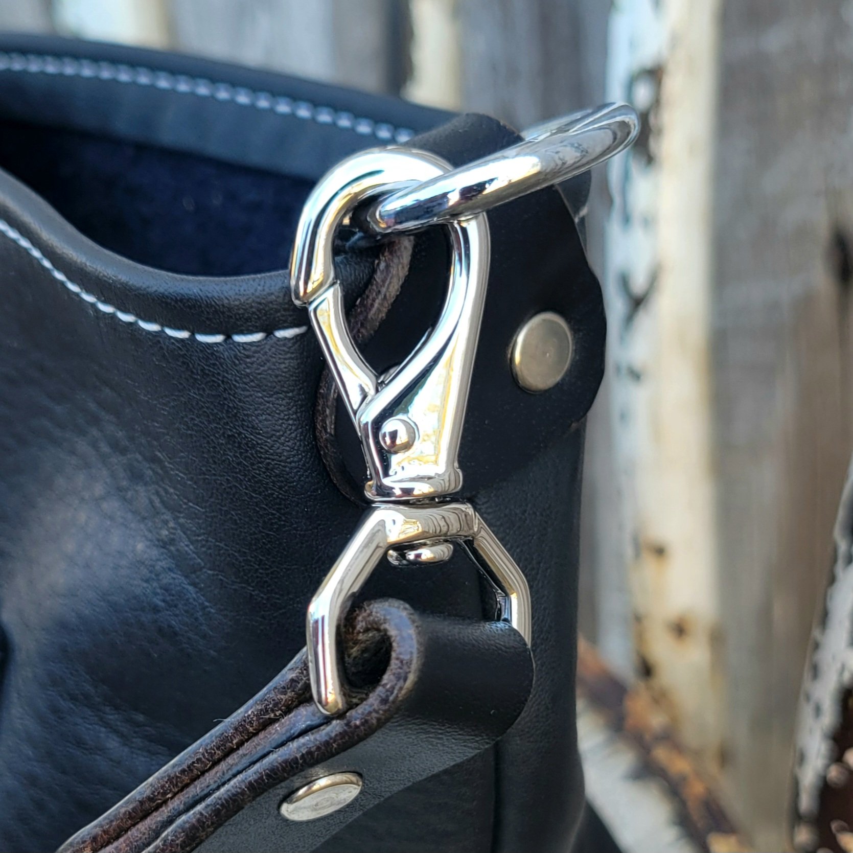 Heavy duty hardware on a leather mini bucket bag
