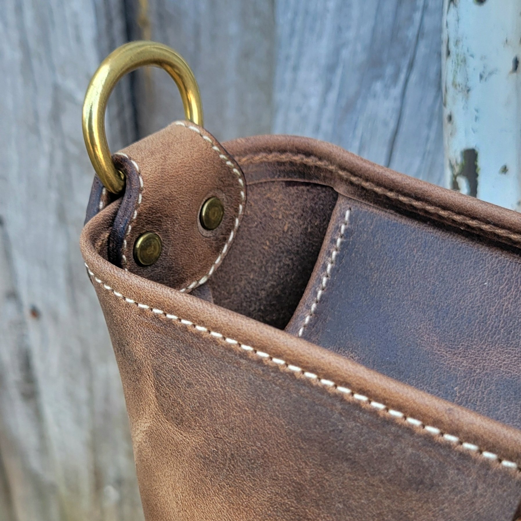 Solid brass D rings to attach additional strap or charms on tote bag