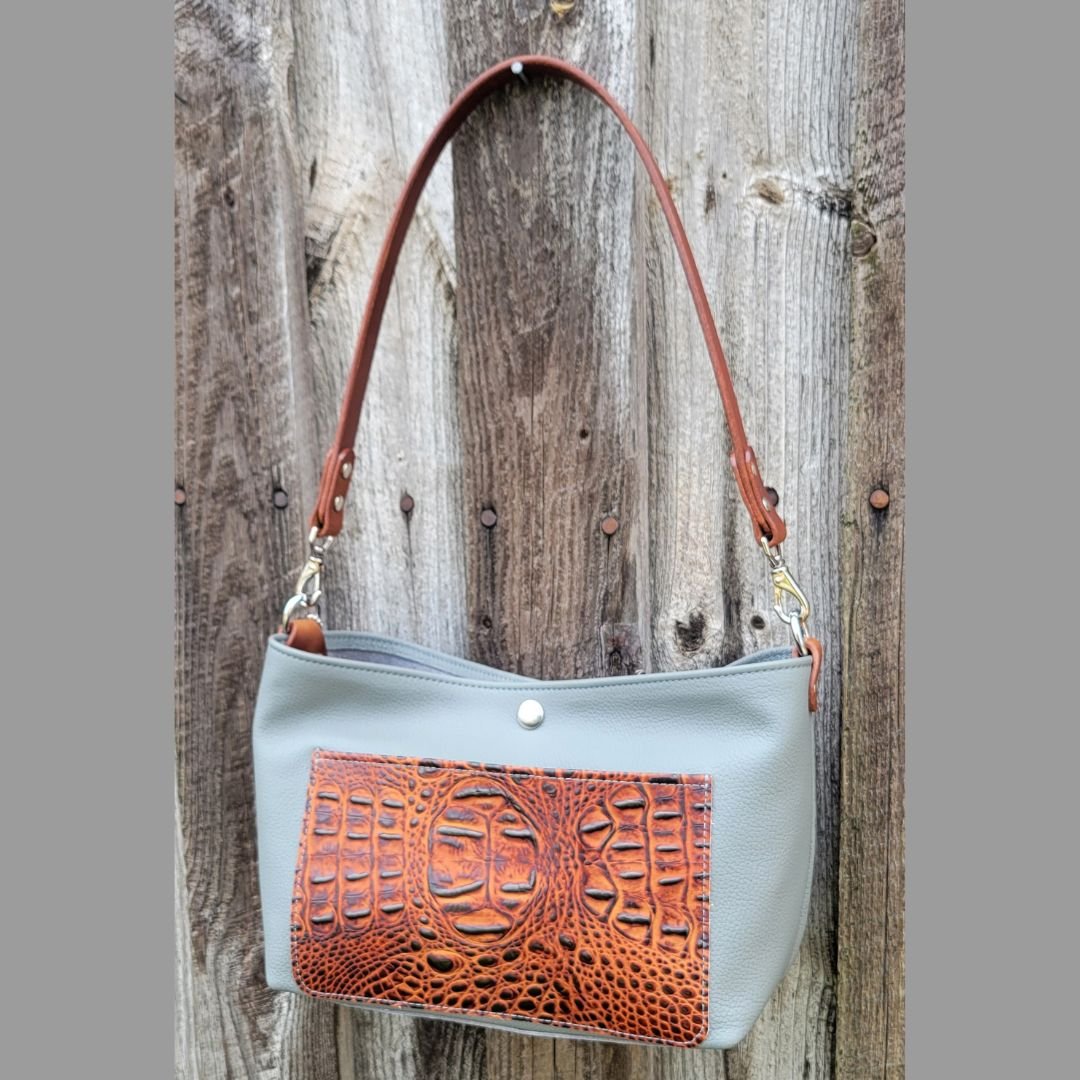 Mini bucket bag with water buffalo strap