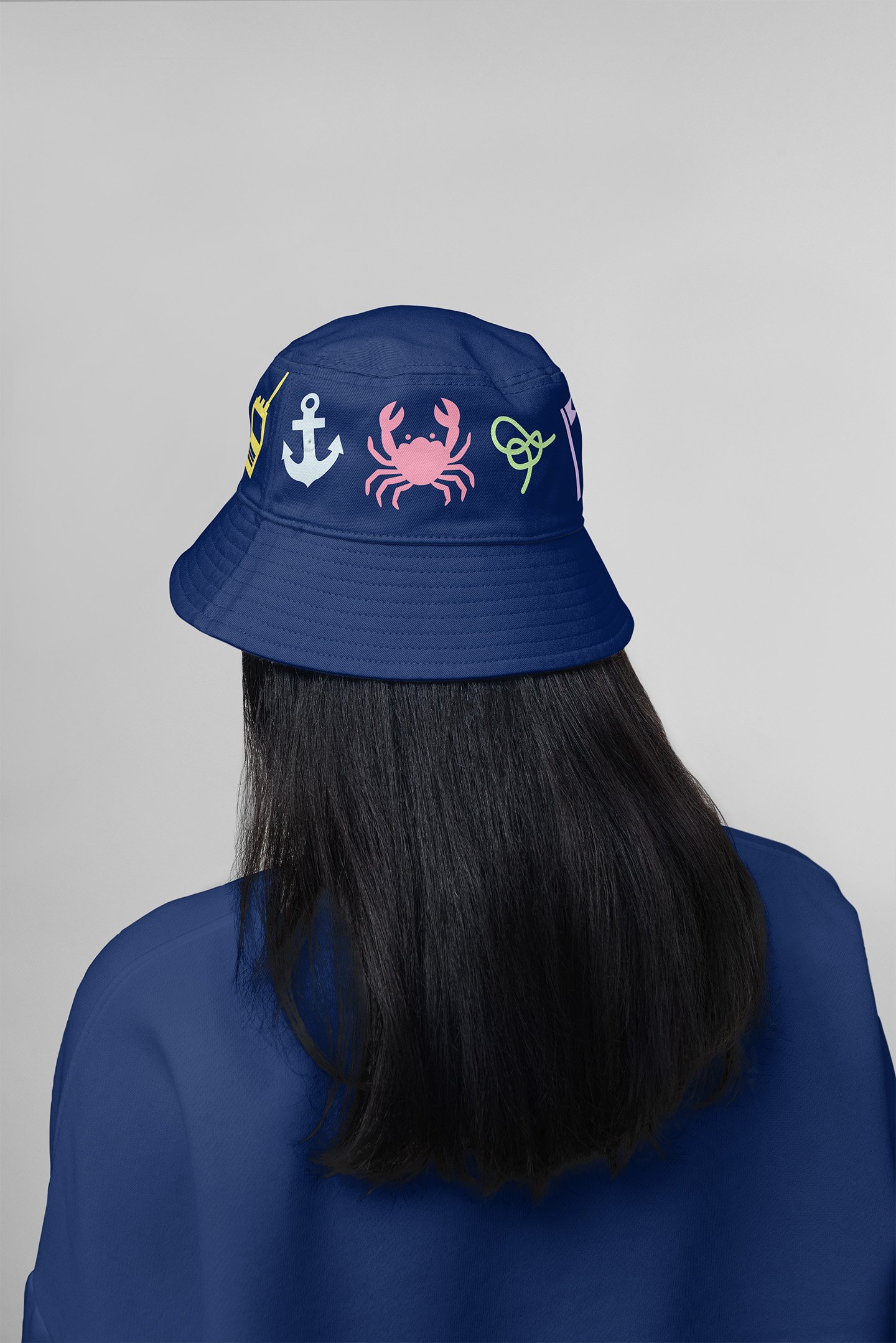 A blue bucket hat with brand illustrations on it