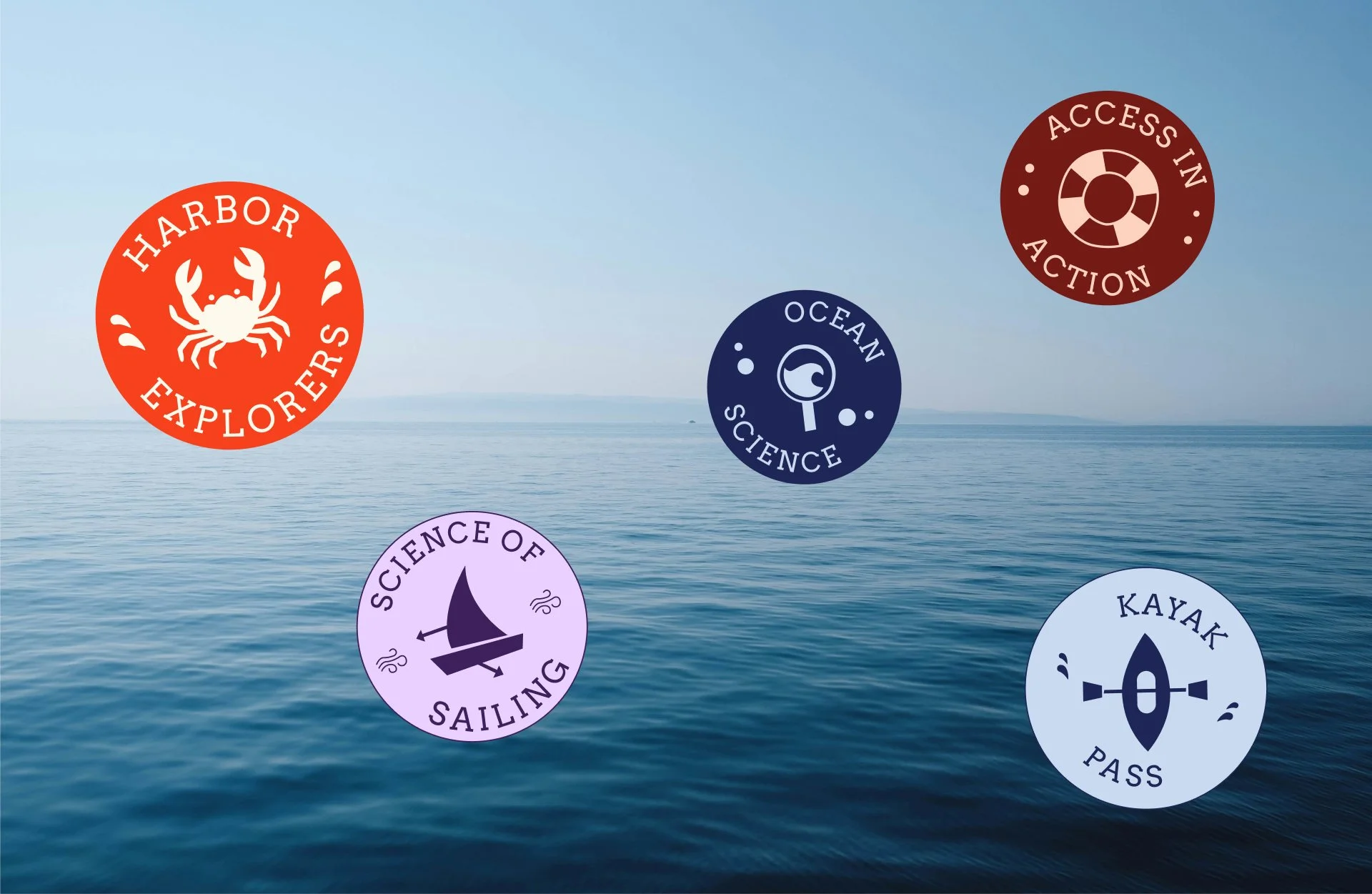 program logos in a sailing badge style with icons like crabs and life rings