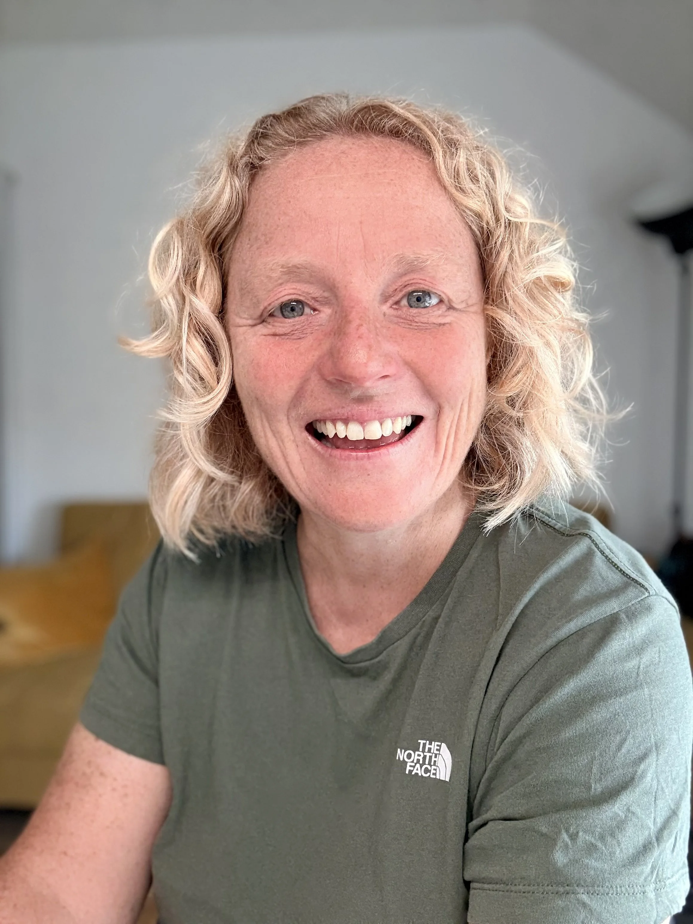 Jane smiling warmly to the camera