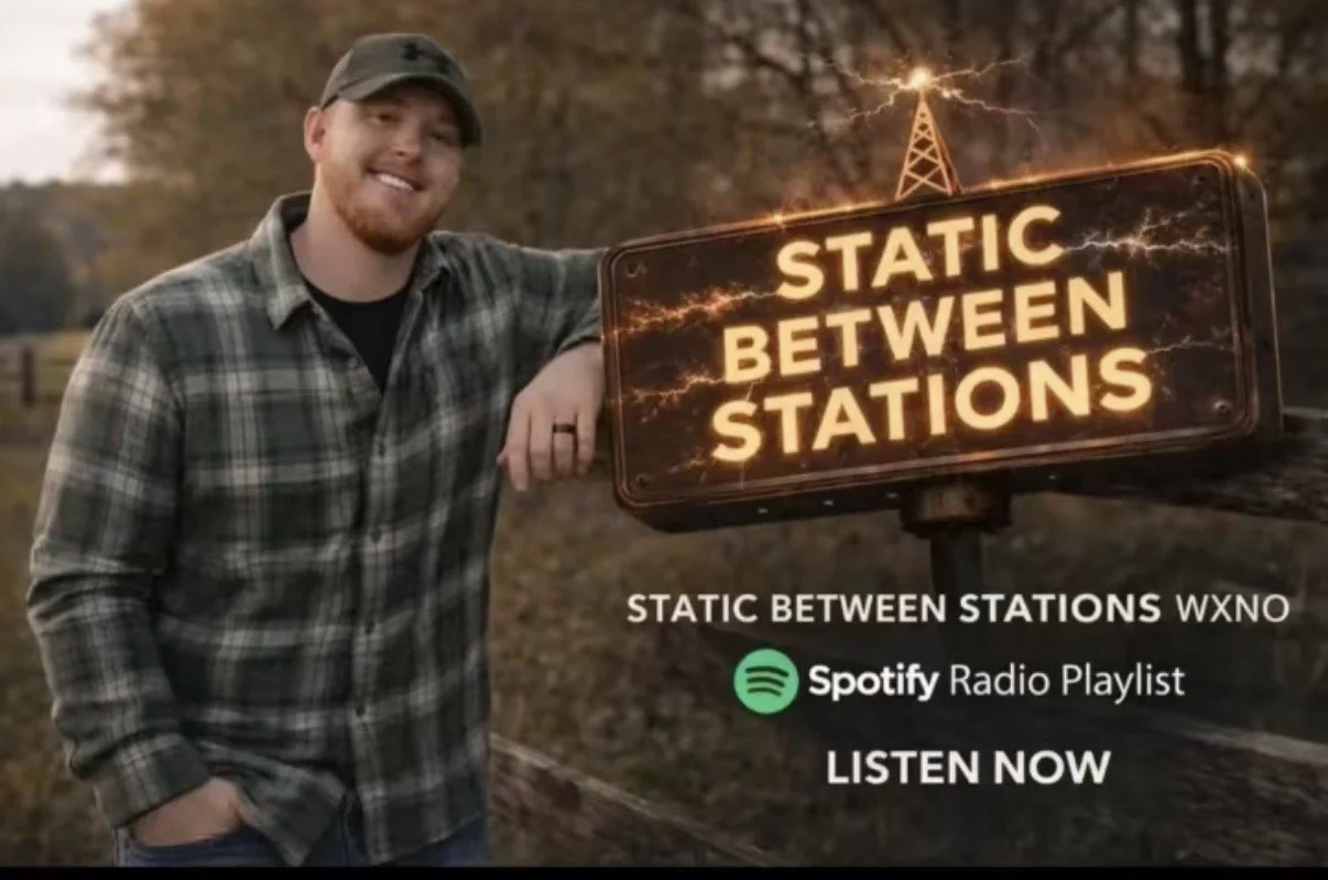 A man in a plaid shirt and cap standing outdoors next to a sign that reads "STATIC BETWEEN STATIONS" with glowing, lightning effects. The image promotes a Spotify radio playlist called "STATIC BETWEEN STATIONS" by WXNO, encouraging listeners to "LISTEN NOW."