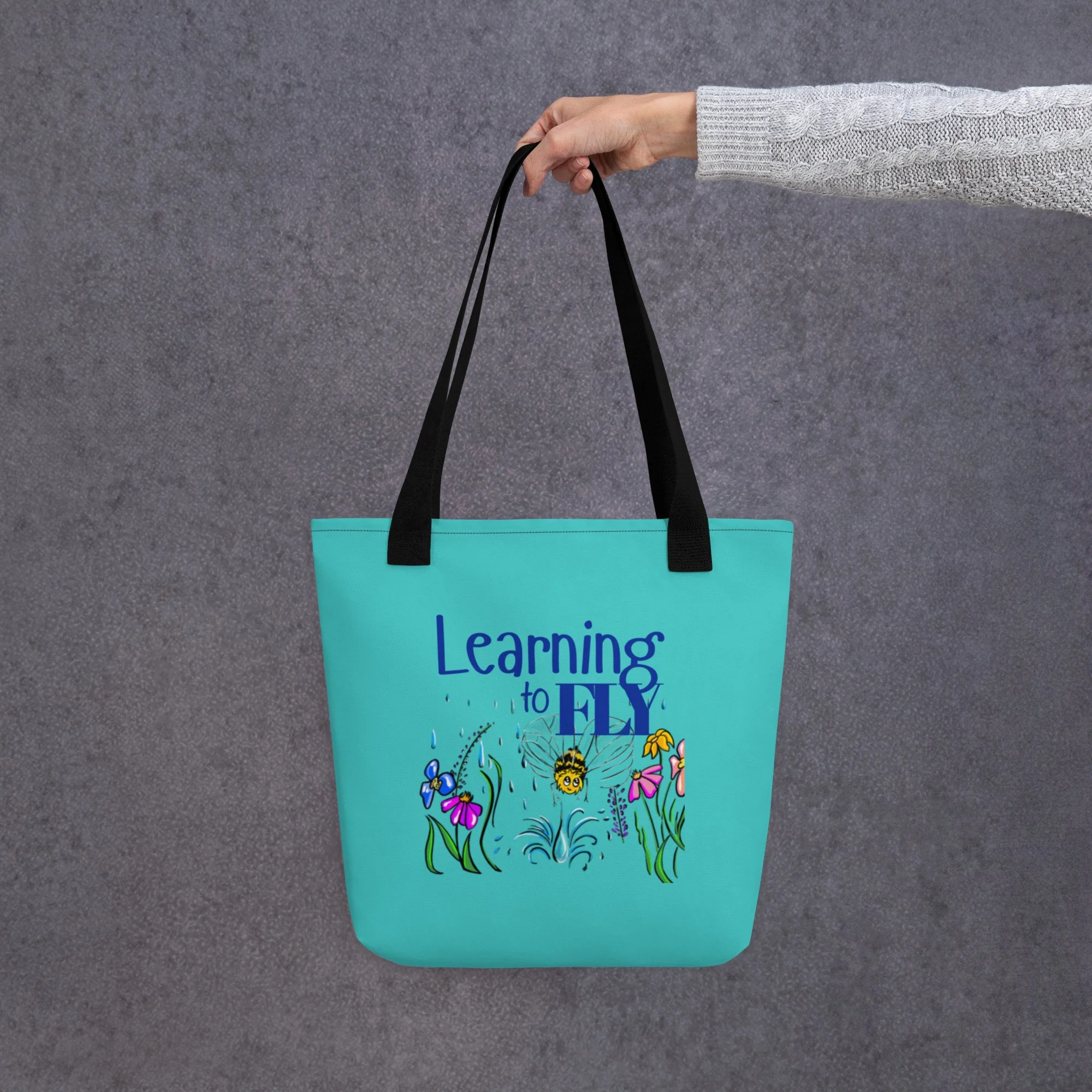 "Learning to Fly"-In the Rain Tote bag