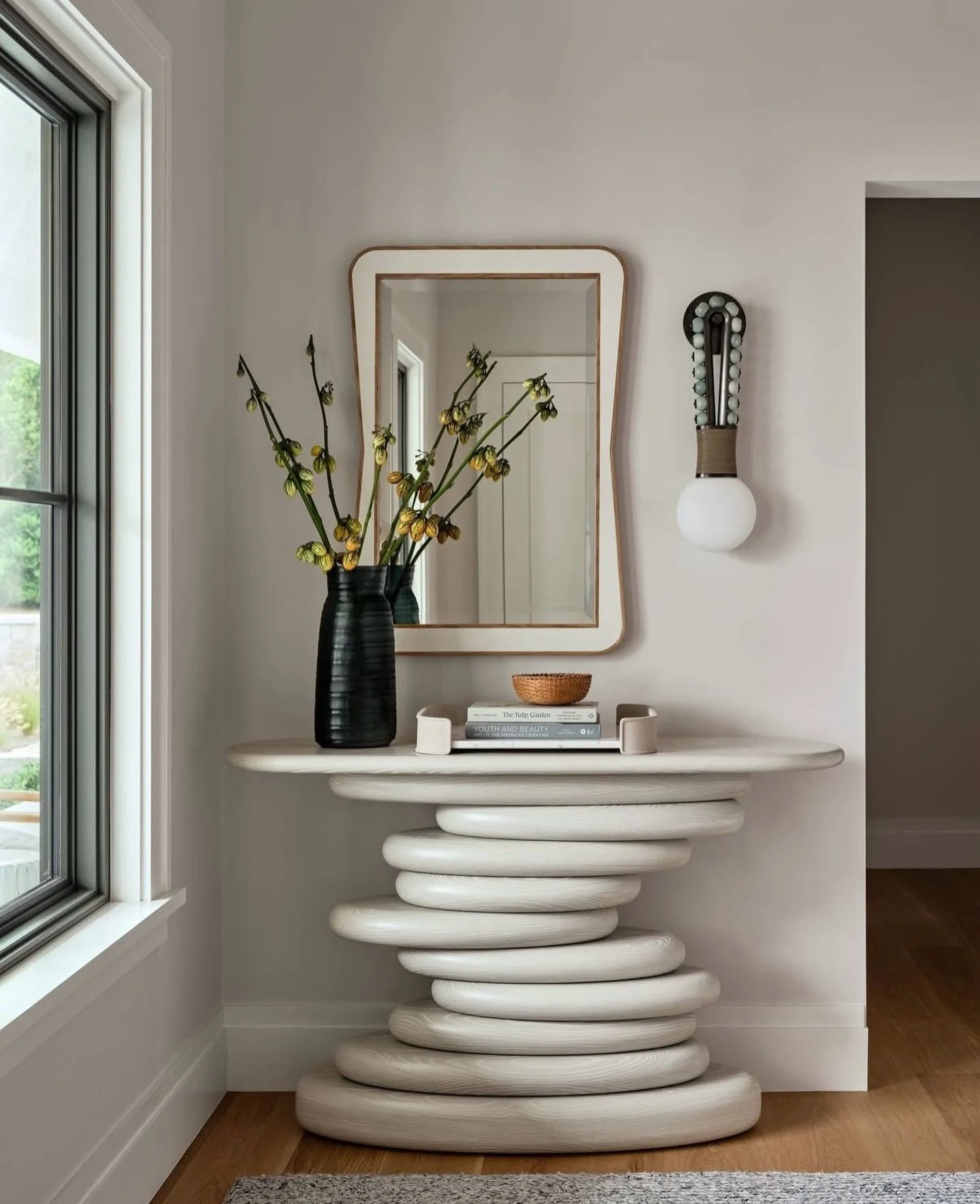 A quiet Sunday reset moment ✨
Honored to see our Stacked Pebble Console anchoring this gorgeous space by award-winning @rrinteriors 🙌🏻✨🤍

Design @rrinteriors 
Photography @readmckendree 

Handcrafted in Iowa @aronsonwoodworks