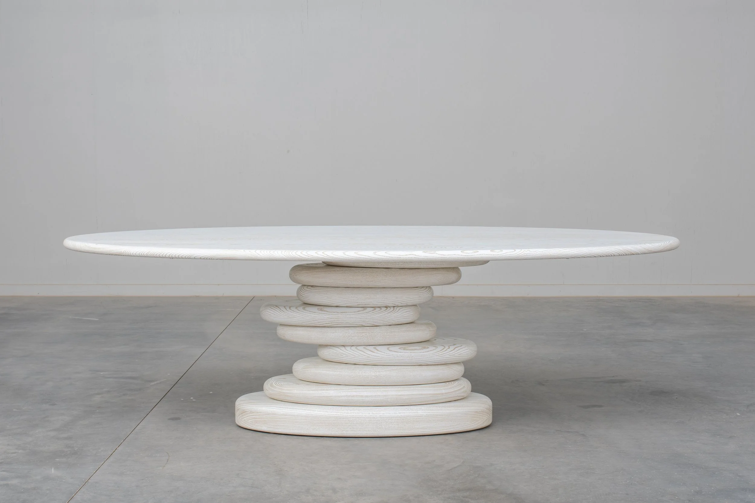 Oval Stacked Pebble Dining Table