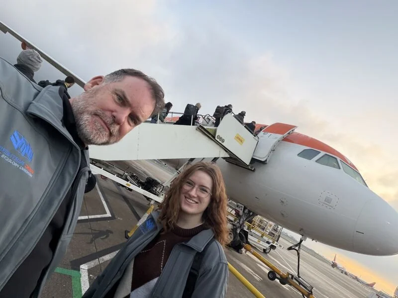 Our team flying to site
