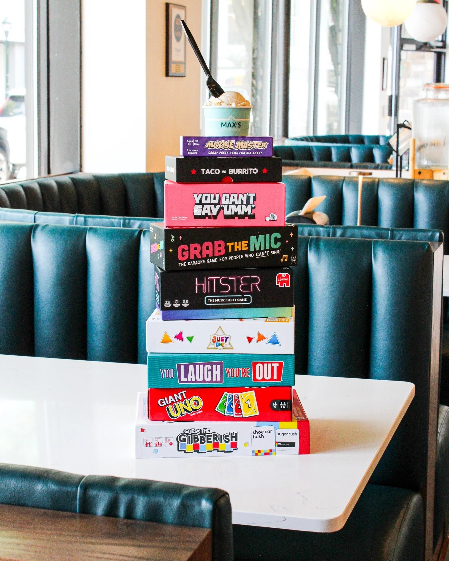 We've always envisioned Max's as a place to gather with friends and family, an inclusive space that welcomes everyone. And now, we have a reason for you to stay a little longer...and PLAY! 🧩 

We have a whole bunch of new games available for you to 