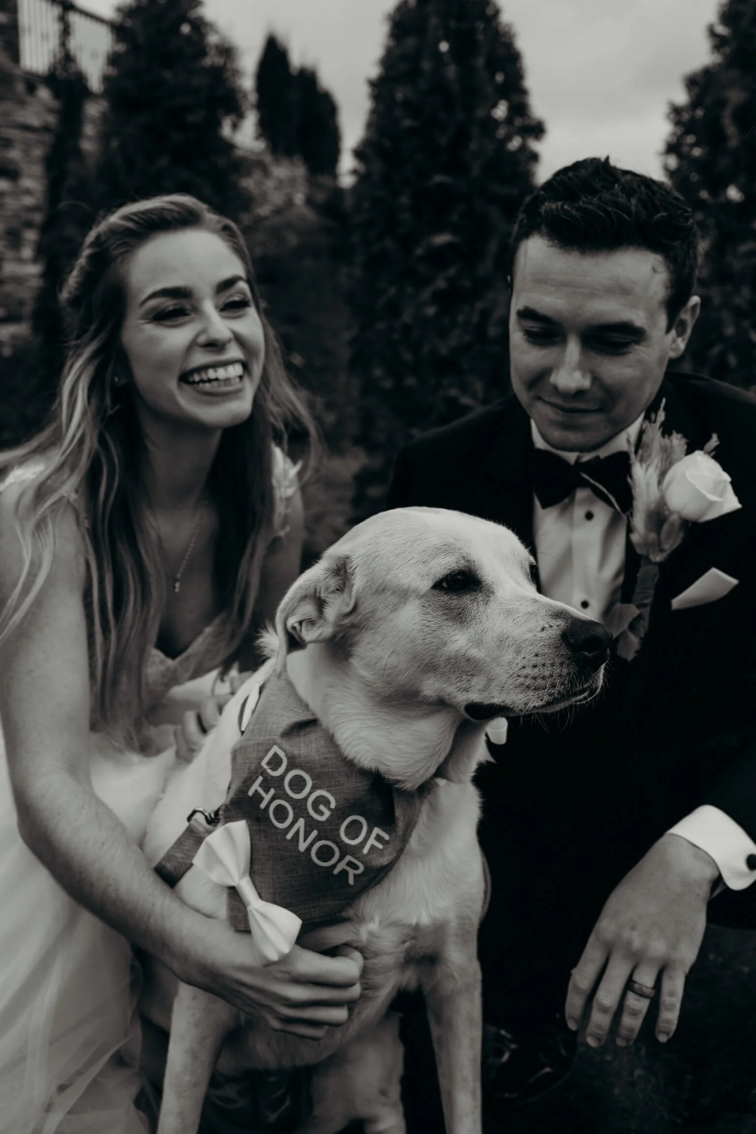 Bride and groom and dog