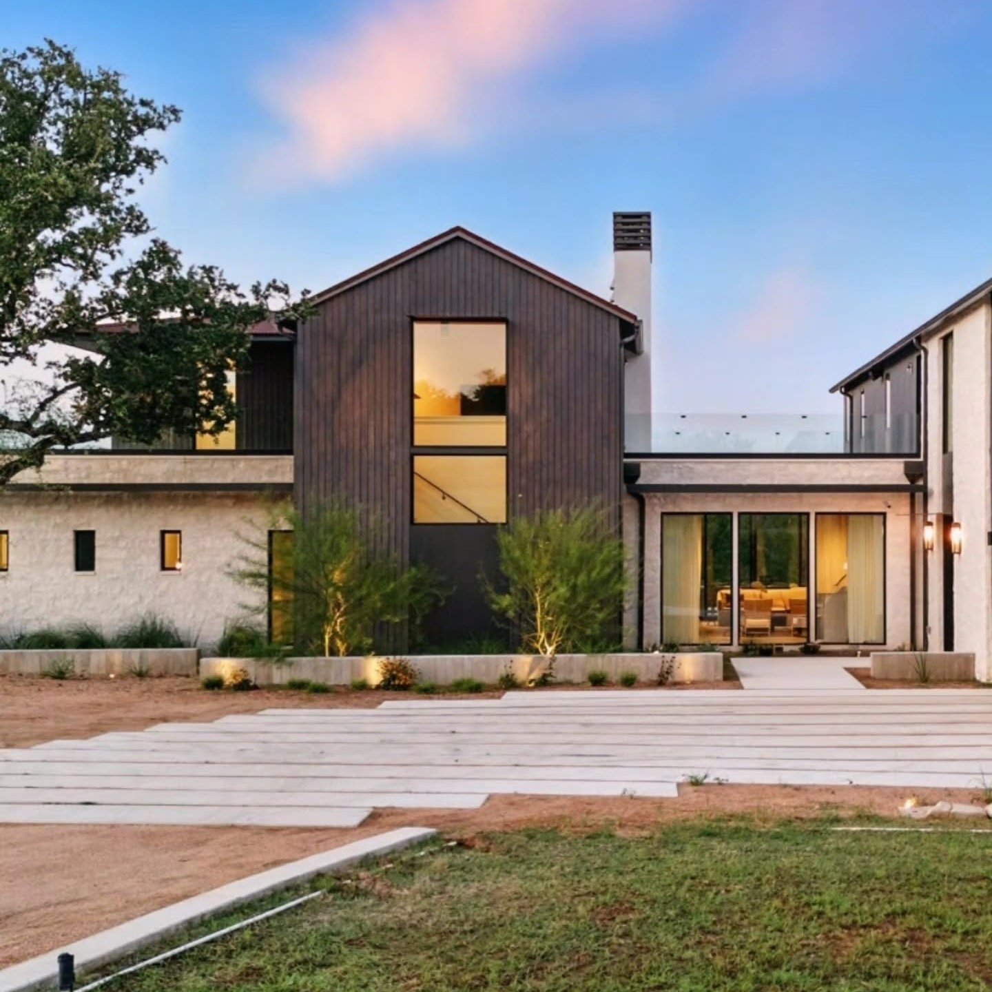 As the sun settles over the Hill Country, homes here have a quieter rhythm. Warm light moves across the rooflines, limestone walls, and terraces, softening the architecture and deepening its connection to the land. From this hour, the views stretch w